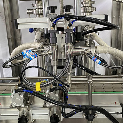 熱したバセリンクリーム 充填機 2ノズル 蓋 密封 レーベルライン